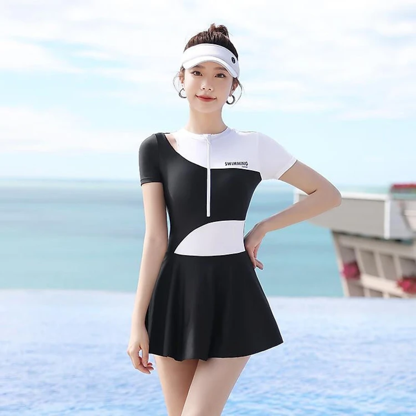 Đồ bơi liền thân phối trắng đen tay dài có khoét vai