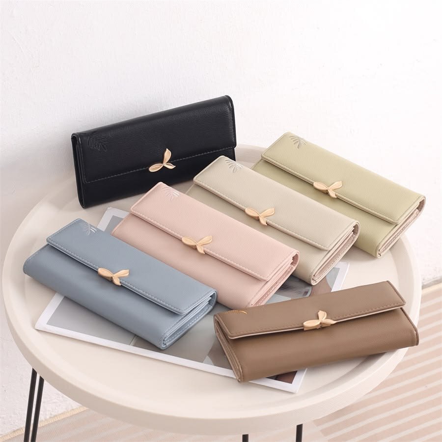 Những chiếc ví cầm tay đầy màu sắc giúp tăng phong cách cho phái nữ - Nguồn: Internet